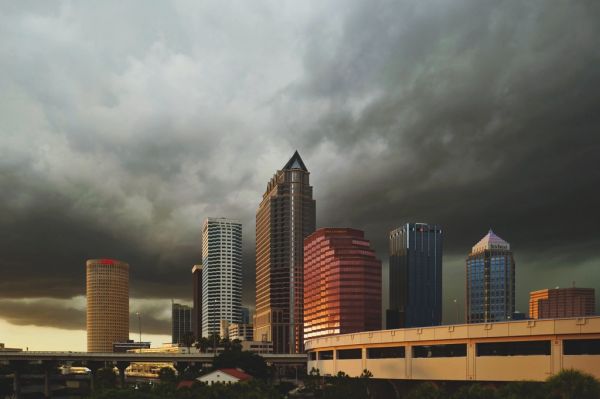 Downtown Tampa skyline under storm clouds
